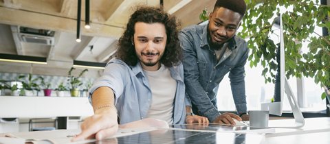 Renewable-energy professionals collaborating on solar technology